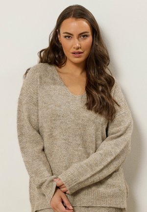 - Sweter