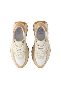 White and beige sneakers with a textured fabric upper, lace closure, and rubber sole featuring a subtle logo on the insole.