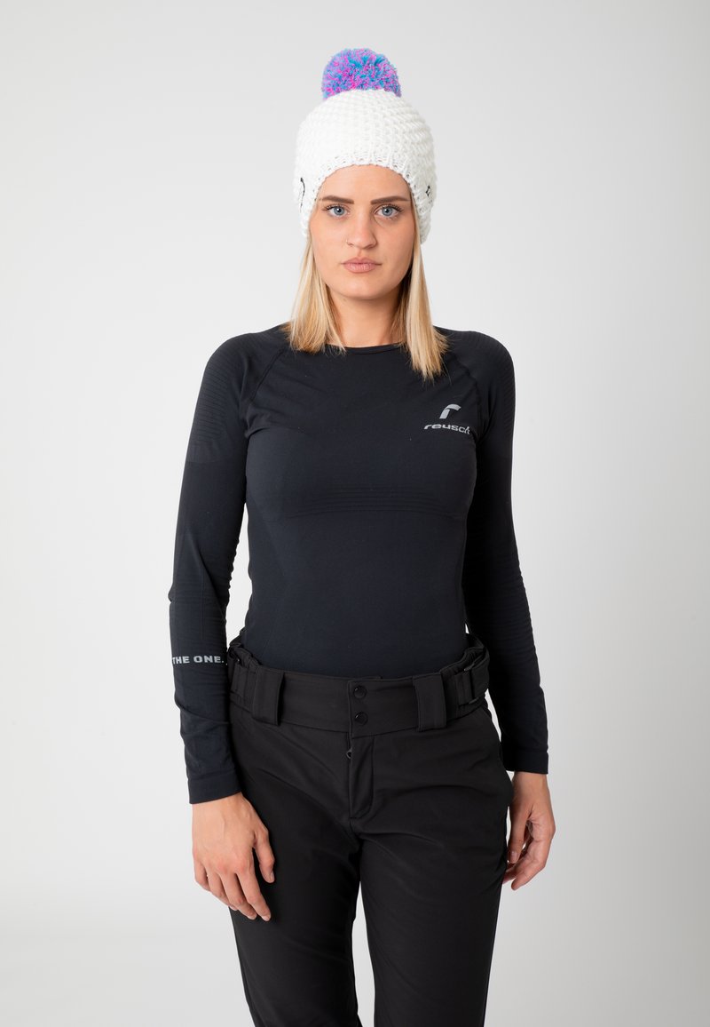 Black long-sleeve base layer top with textured design, paired with black pants featuring a belt. White knitted beanie with colorful pom-pom.