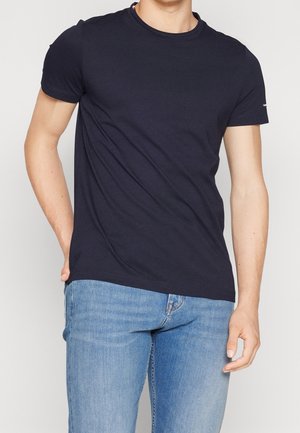 Navy blue short-sleeve t-shirt made of cotton, featuring a round neckline and a slim fit, with a smooth texture and minimal detailing.