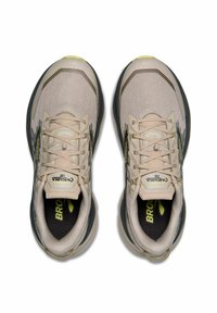 Beige mesh running shoes with gray accents and textured overlays. Features round laces, cushioned insole, and logo detail on the tongue.