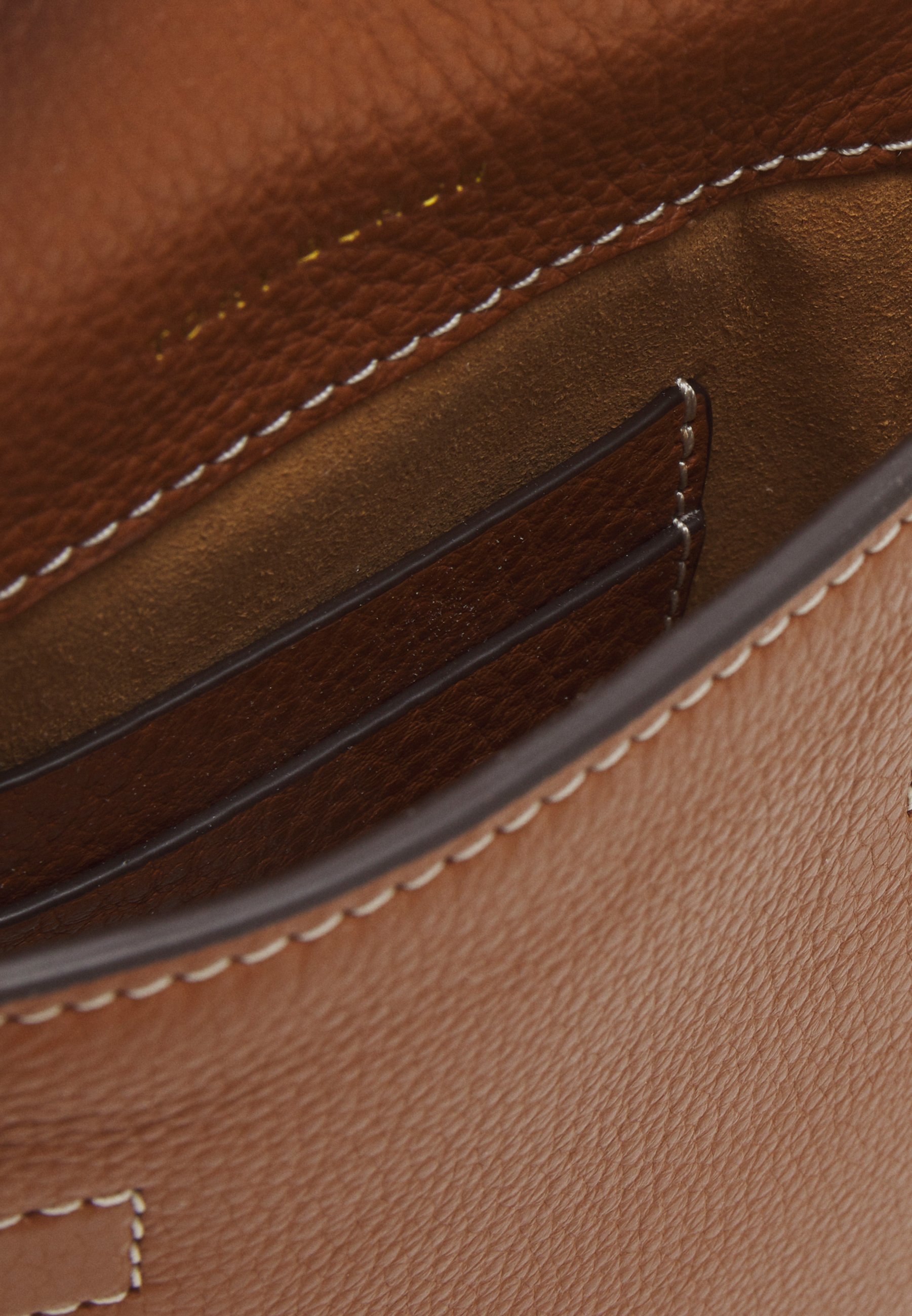 tory burch phone holder