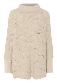 Strikket sweater i en lys beige farve med høj hals, brede ærmer og teksturerede bølgemønstre med åbenstrikkede detaljer over det hele.