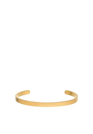 Thin open-ended gold metal cuff bracelet with a smooth, polished surface on a white background.
