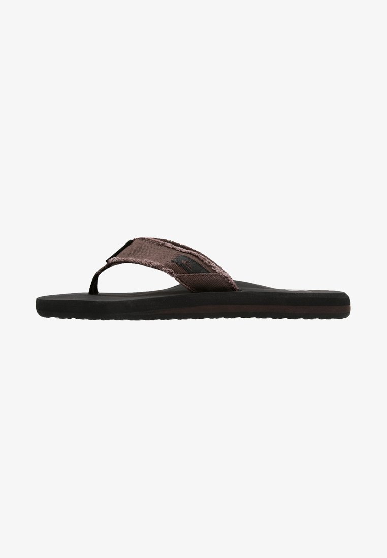Brown flip-flop with a textured, fabric strap and a black rubber sole. The strap features a logo and a subtle sheen for added detail.