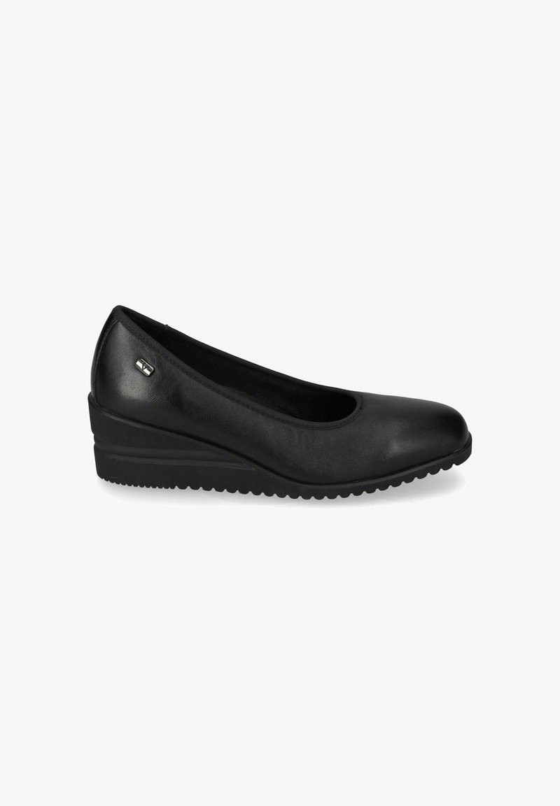 Scarpe con tacco a cuneo nere con tomaia in pelle liscia, punta rotonda e suola in gomma texturizzata per una buona aderenza. Accentate da un piccolo dettaglio metallico.