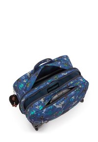 Rolling suitcase in navy fabric with colorful marine-themed patterns. Features double zippers, two compartments, and a plush monkey keychain.