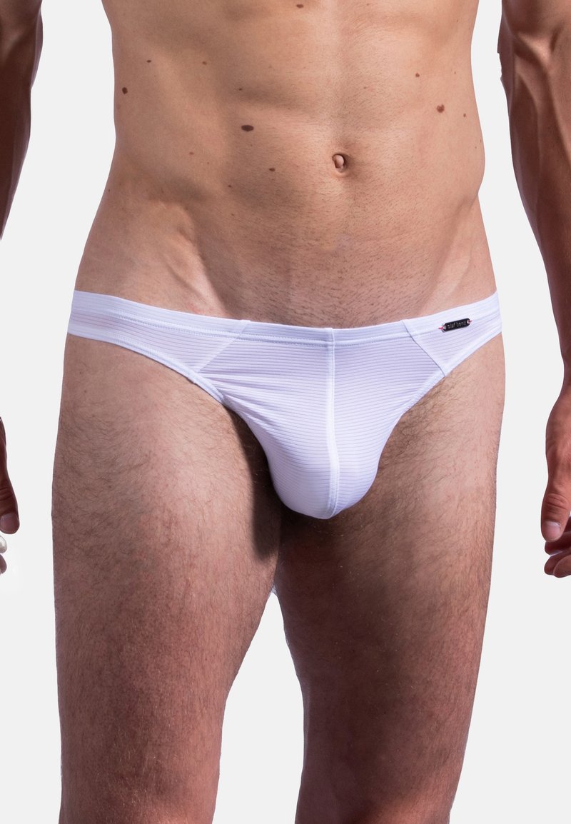 Witte mannenonderbroek met ribbelstructuur, lage taille en elastische tailleband. Bevat een klein zwart logo accent aan de voorkant.