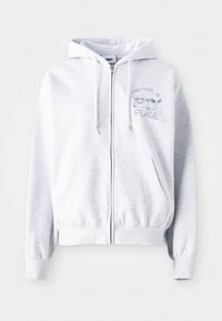 Hele halli tõmblukkidega kapuutsiga dressipluus, millel on tasku-känguru. Üksik tekst: "VABA ON" kassi kohal ja "RAHA" all. Pehme puuvillane segu.