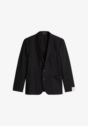 Blazer noir à simple boutonnage avec revers crantés, deux boutons sur le devant, poches plaquées, et une étiquette sur le poignet de la manche gauche.