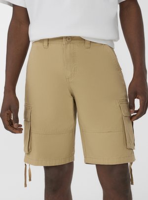 Pantaloni cargo beige realizzati in tessuto intrecciato, con tasche laterali, vestibilità dritta e cordini regolabili all'orlo.