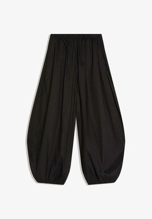 Pantalon large noir fluide avec taille élastique et poignets élastiques froncés aux chevilles, présenté sur fond blanc.