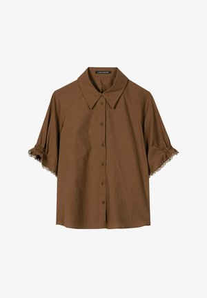Brown short-sleeve button-up shirt with a pointed collar and gathered, fringed sleeve hems, displayed on a white background.