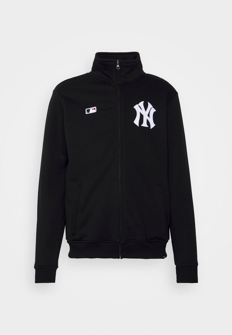 Black zip-up jacket made of soft fabric, featuring high collar, two side pockets, and white embroidered New York Yankees logo on chest.