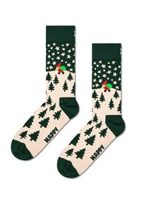 Ponožky po kolena se zeleným lemem, se světlým tělem zdobeným zelenými stromy a podivuhodným skřítkem mezi bílými hvězdami, označené "ŠŤASTNÝ."