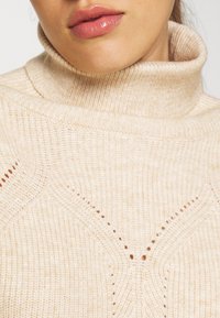 Molly Bracken Sweter