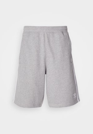 Calções atléticos cinzentos feitos de um tecido de mistura de algodão. Apresenta bolsos laterais, cintura elástica e riscas brancas laterais. Design clássico.