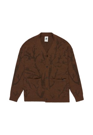 Bruine cardigan met een gemêleerd patroon, v-hals, twee voorzakken en zwarte knopen. Gemaakt van een zachte wolmix.