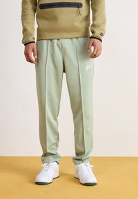 Nike Sportswear Träningsbyxor - mint