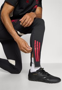 adidas Performance LIVERPOOL FC TIRO 25 COMPETITION TRAINING PANTS - Article de supporter d'équipe de club - black