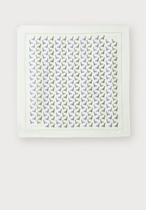 Τετράγωνη μεταξωτή μαντήλα με λευκό φόντο. Διακοσμημένη με μικρά πράσινα και μπλε σχέδια, περιβραχιόνιο με ένα ανοιχτό πράσινο περίγραμμα.