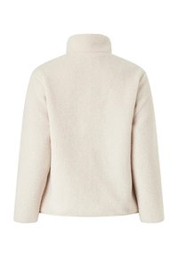 Lys beige fleece top med høj krave, struktureret overflade og lange ærmer. Designet uden synlige lukninger eller mønstre.