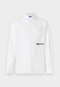 White long-sleeve button-up shirt made of cotton, featuring a chest pocket and black embroidered "KARL LAGERFELD JEANS" logo on the front.