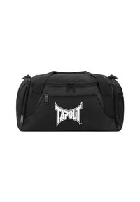 Bolsa de deporte negra hecha de tela duradera, con un bolsillo frontal con cremallera y el logo "TAPOUT" en blanco. Incluye dos asas y una correa ajustable.