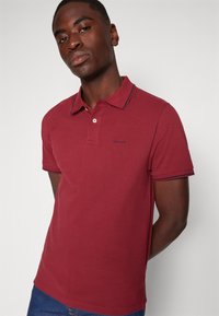 GANT Polo marškinėliai - plumped red