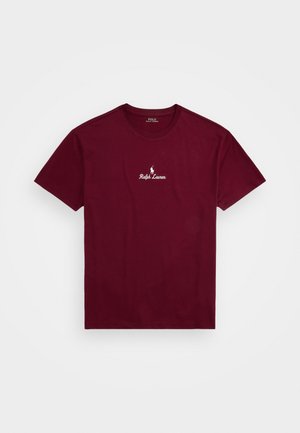 Burgundska bombažna majica s kratkimi rokavi, ki vključuje diskreten bel vezen logotip in okroglo ovratnico.