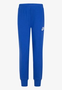 Modré tepláky z měkké látky, s elastickým pasem a žebrovanými manžetami; obsahují malé bílé logo Nike na levém stehně.