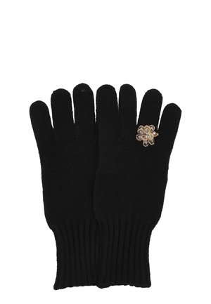 Pair of black knit gloves with ribbed cuffs and a small decorative gold and crystal flower on one glove's ring finger.