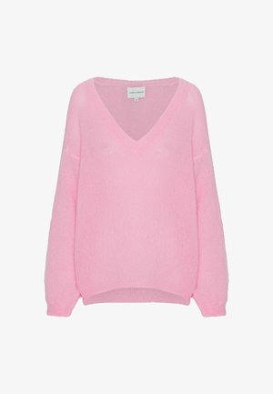 Suéter largo de manga rosa suave con cuello en V y puños y bajo acanalados, mostrado sobre fondo blanco.