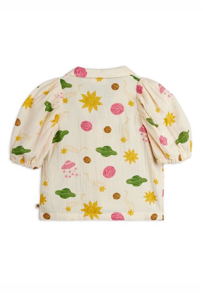 Μπλούζα εκρού με μακριά μανίκια και φουσκωτά μανίκια, διακοσμημένη με πολύχρωμα σχέδια ήλιων, πλανητών, κομητών και ροζ UFO.