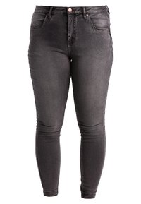 Jeans de denim negro ajustados con cintura alta, con cierre de botón, dos bolsillos frontales y una textura suave.