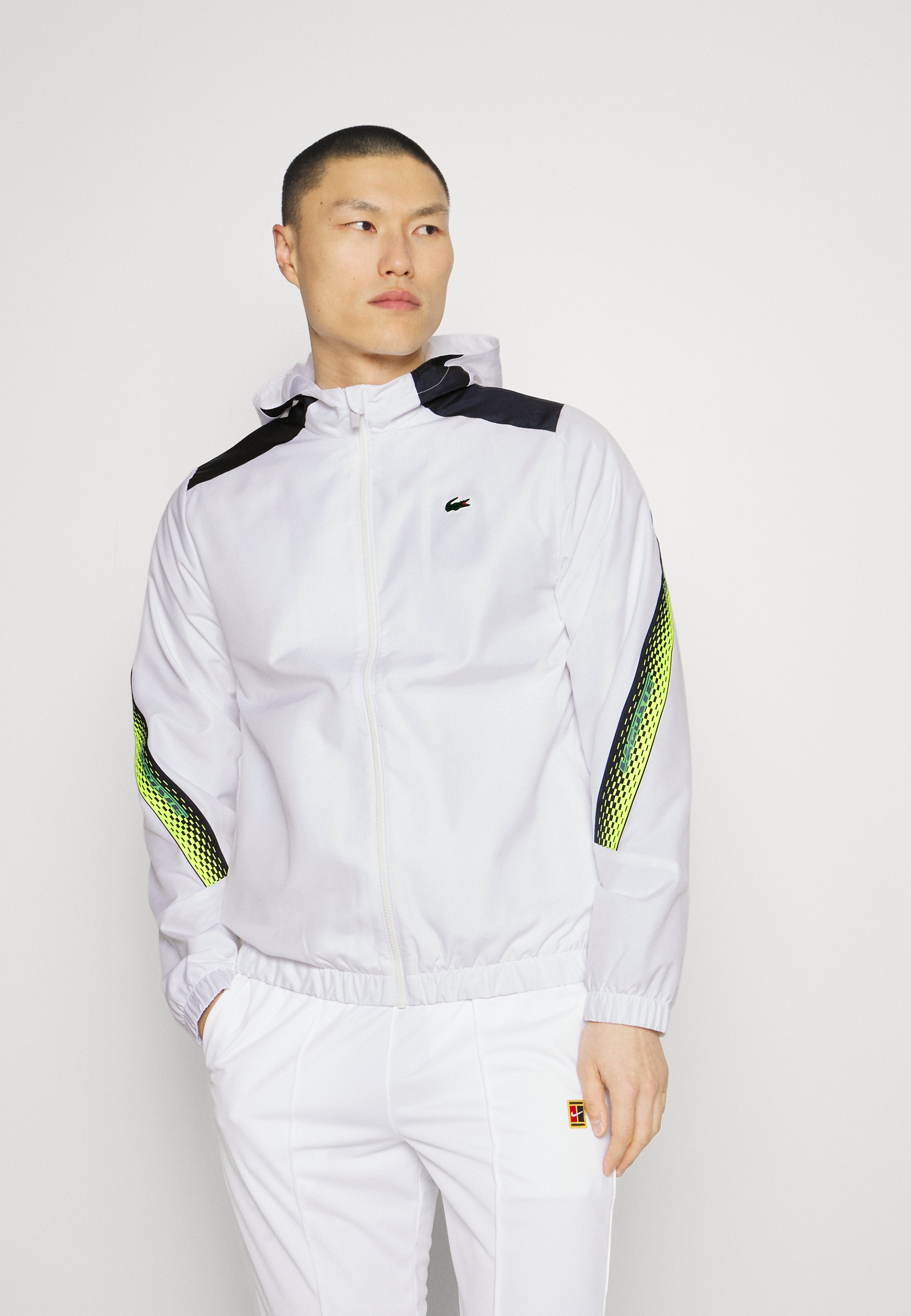 Lacoste TENNIS Trainingsjacke blanc/bleu - - marine/jaune/weiß Sport