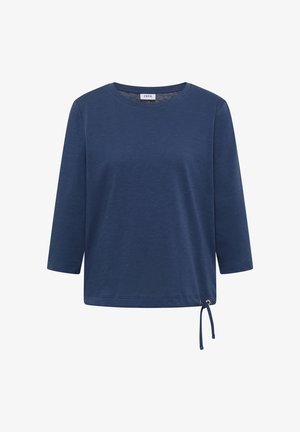 Tmavě modrá košile s dlouhým rukávem, kulatým výstřihem a nastavitelným šňůrkovým stahováním na spodním pravém lemu.