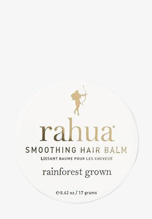 Contenant de baume lissant pour cheveux Rahua avec texte doré et logo d'archer, étiqueté "cultivé en forêt tropicale", 0,62 oz/17 grammes.