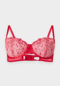 Červená čipkovaná podprsenka s kvetinovou výšivkou, s výstužou pod prsiami, nastaviteľnými ramienkami a malým príveskom v tvare srdca v strede predného pásika.