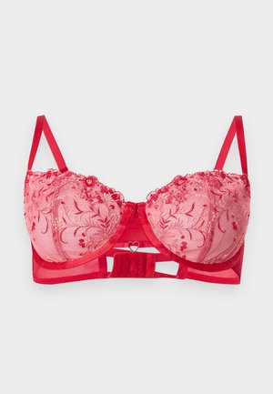 Κόκκινο δαντελωτό σουτιέν με κεντήματα λουλουδιών, στήριξη με μπανέλα, ρυθμιζόμενους ιμάντες ώμου και ένα μικρό κομψό καρδιάς στο κέντρο της μπάντας μπροστά.