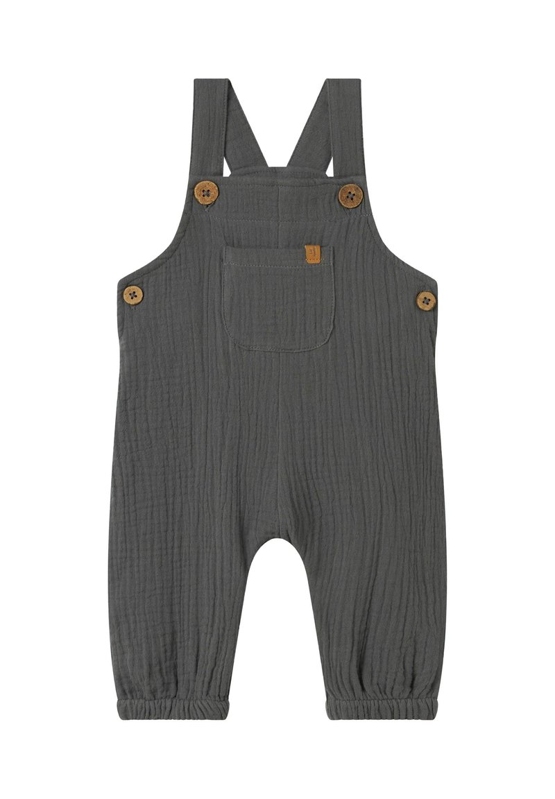 Tuta in cotone grigio con bretelle regolabili, bottoni in legno, una tasca frontale e polsini elastici. Tessuto texturizzato con un aspetto stropicciato.