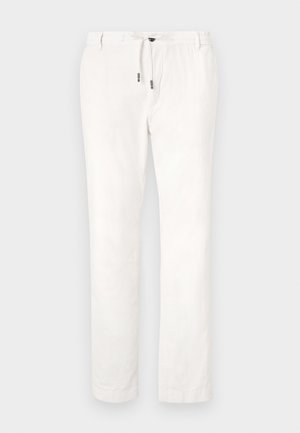 Valged linased püksid elastse vöökoha, nööride sulgemise ja sirgete jalgadega. Sile tekstuur ja minimaalne disain ilma nähtavate mustriteta.