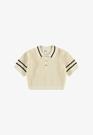 Gehaakte, beige polo met een gestructureerd breipatroon, voorzien van zwarte strepen op de korte mouwen en drie tankleurige knopen aan de voorkant.