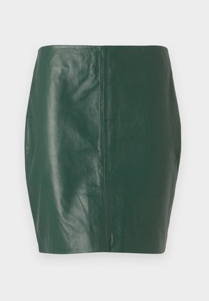 Green leather mini skirt with a smooth texture and fitted shape. Features a seamless design with no visible closures or hardware.