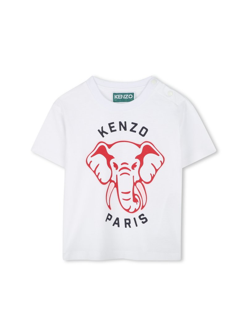 T-shirt blanc à manches courtes en coton avec un graphique d'éléphant rouge et le texte "KENZO PARIS" en dessous, avec des boutons pression sur l'épaule.