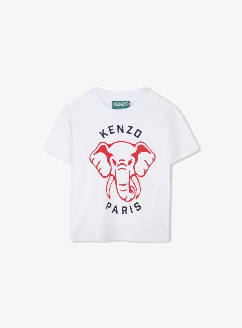 T-shirt blanc à manches courtes en coton avec un graphique d'éléphant rouge et le texte "KENZO PARIS" en dessous, avec des boutons pression sur l'épaule.