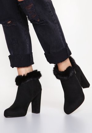 High heeled ankle boots - black