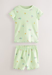 Conjunto de pijama de algodón color verde claro que incluye una camiseta de manga corta y pantalones cortos. Ambos decorados con un patrón floral y bordes ondulados.