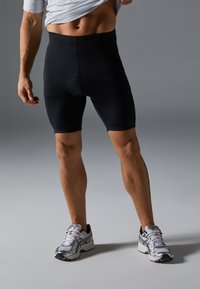 Pier One Sport CYCLING BIB SHORTS WITH PADDING & BACK ZIP POCKET - Kolesarske kratke hlače z naramnicami - black