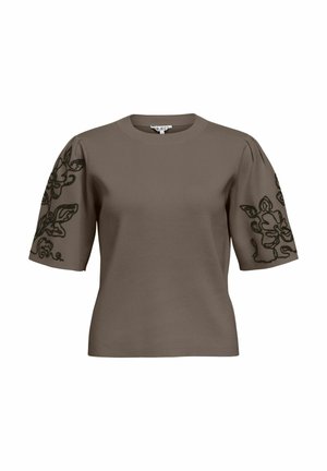 Haut taupe à manches courtes avec encolure arrondie et broderie florale noire sur les manches bouffantes.